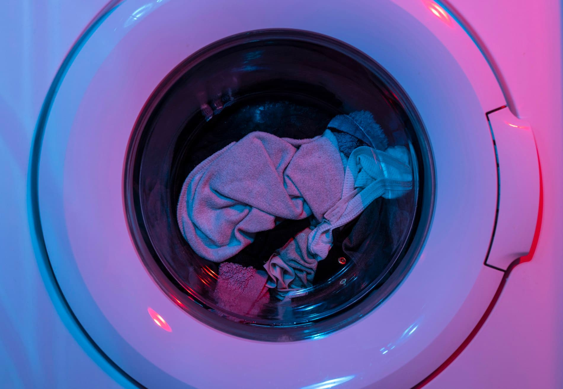 Welltron washing machine with a glowing drum